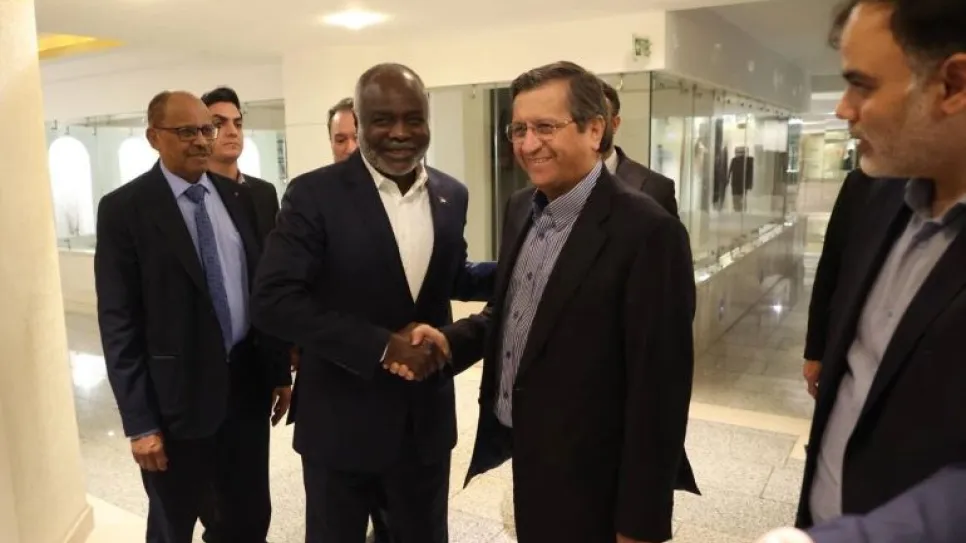 وزير المالية السوداني جبريل إبراهيم ونظيره الإيراني.jpg