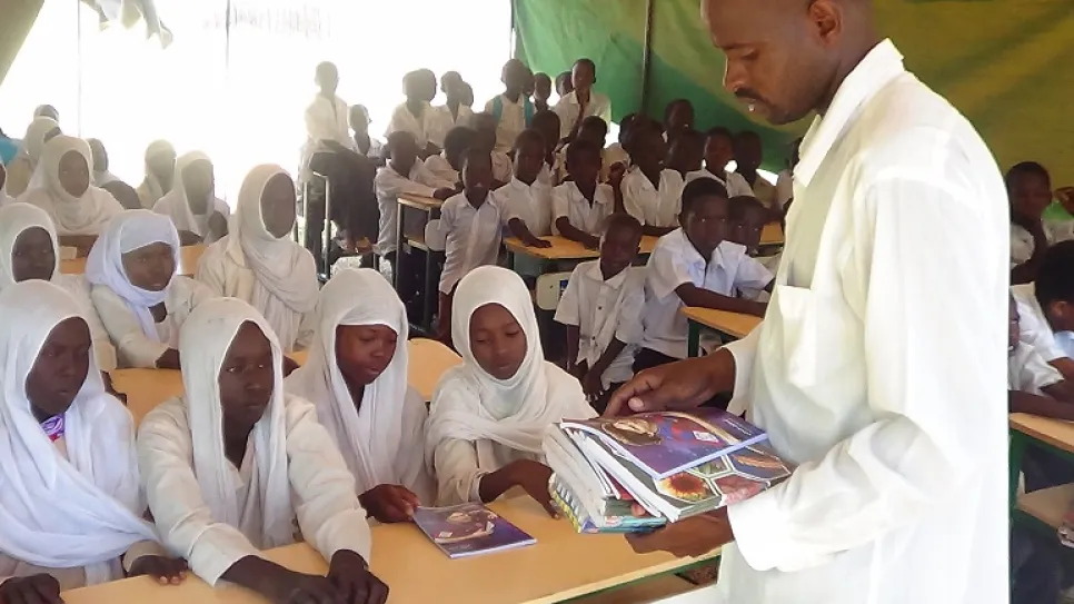 Students receiving notebox in BN.jpg