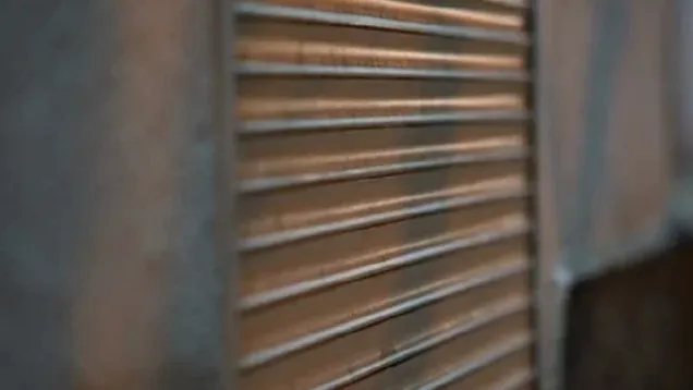 roller-shutters-closed-shop-door-footage-127750312_iconl.jpg
