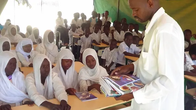 Students receiving notebox in BN.jpg